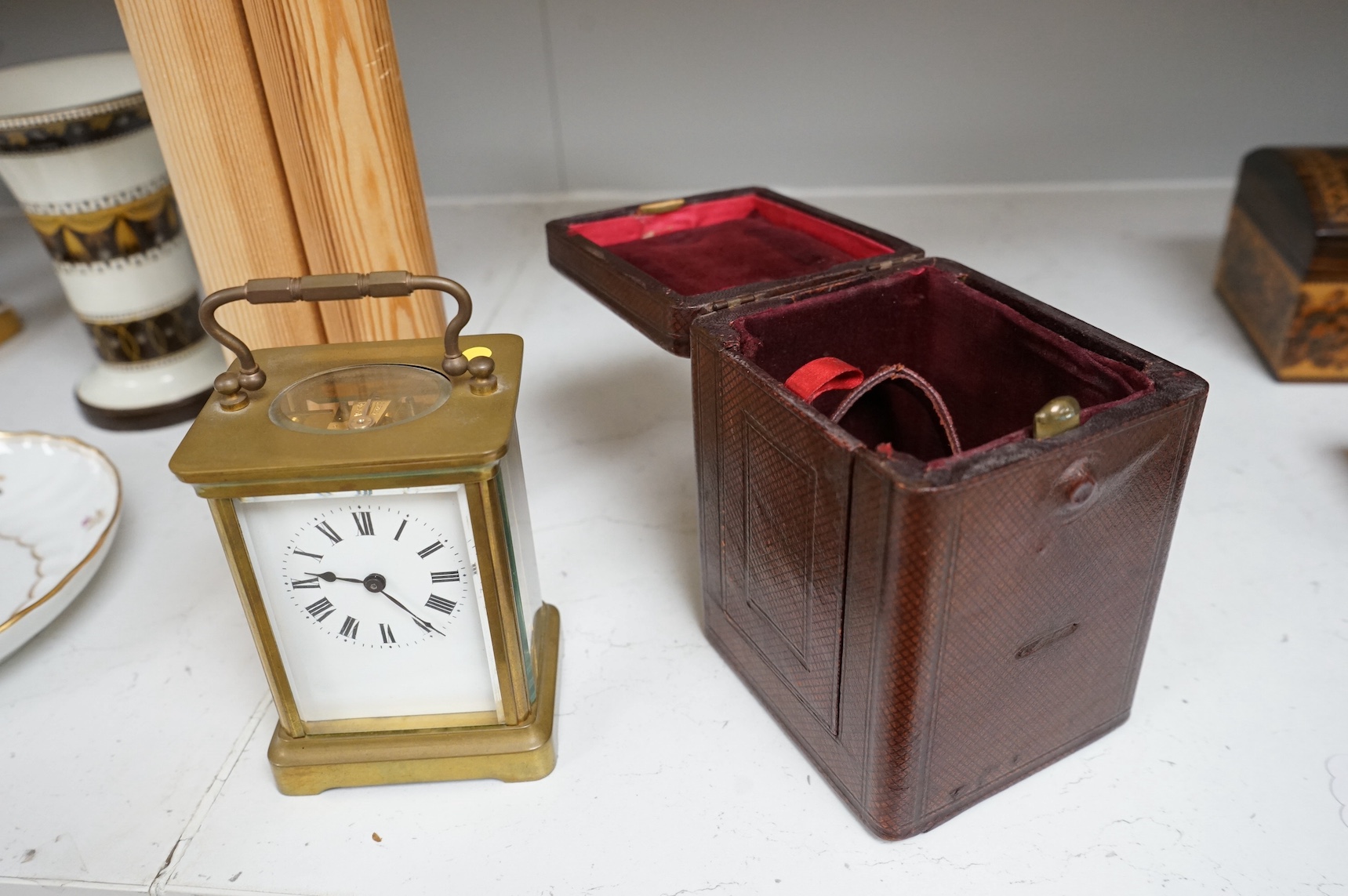 A leather cased carriage timepiece with key, 12cm. Condition - good, not tested